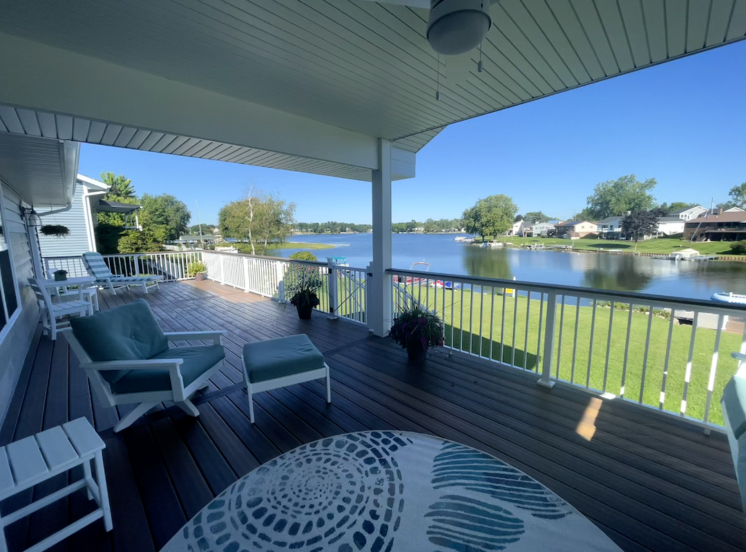 Covered porch and expansive deck on Lake Somerset, MI